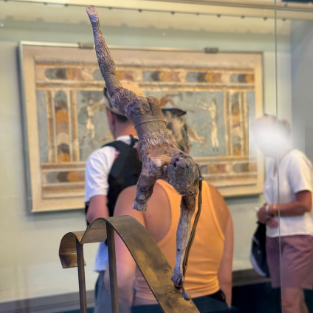 The ivory bull-leaper from Knossos, caught mid-movement.